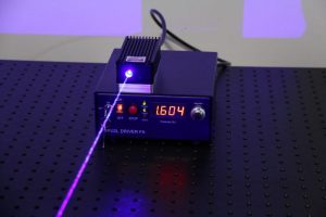 Laser Driver Emitting a Purple Laser Beam